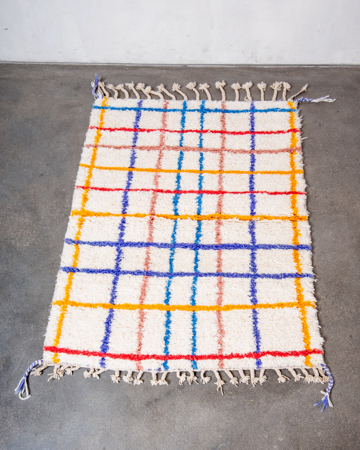 Modern, designer, handcrafted Berber rug from Morocco. Beniourain carpet with beautiful colours and patterns and fluffy wool texture.